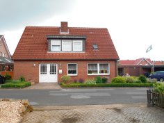 Ferienwohnung Ten Brink Ein Haus, in dem sich eine Ferienwohnung befindet.